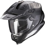 Black and gray Scorpion helmet with clear visor on a white background