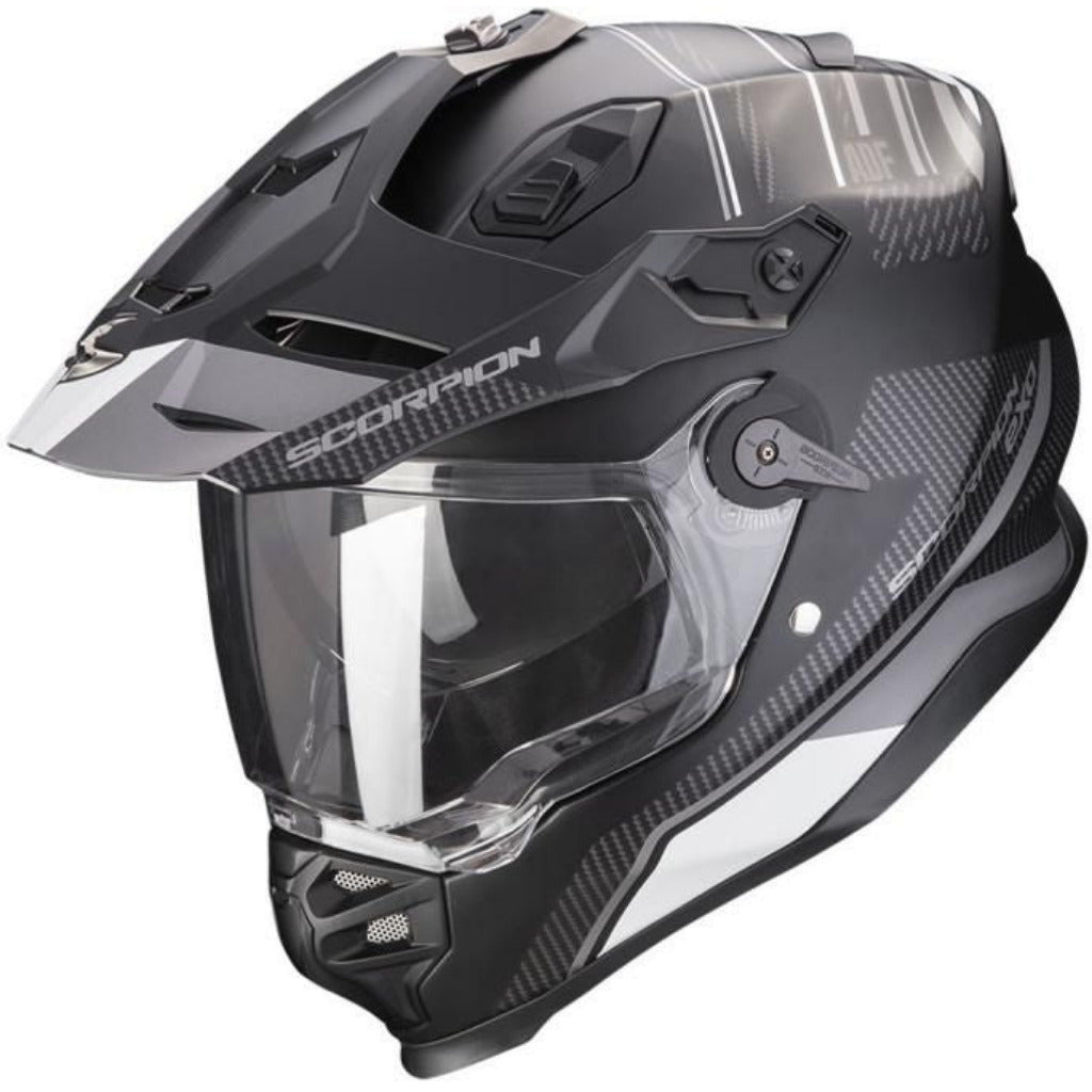 Black and gray Scorpion helmet with clear visor on a white background