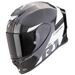 A carbon fiber full-face motorcycle helmet in black and white with a dark visor, featuring the 'R1' and 'SCORPION' branding on a clean white background.