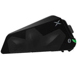 Black electronic device with a green light on a black background
