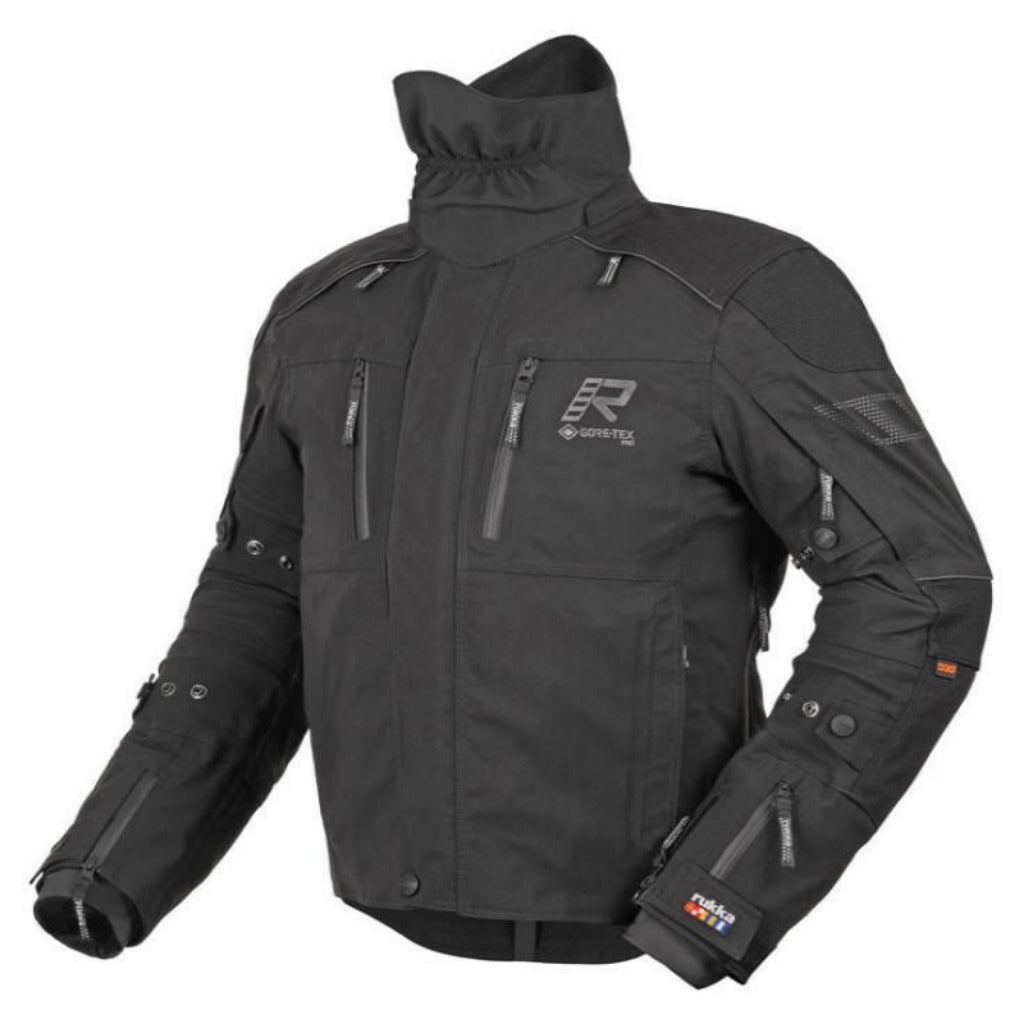 A black technical motorcycle jacket with a high collar, multiple zippered pockets, and protective armor plates, shown on a plain white background.