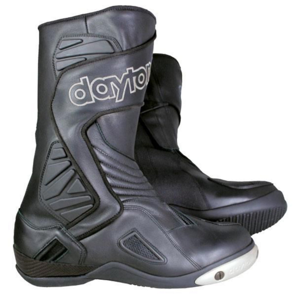 A pair of black leather Daytona motorcycle boots with white branding, shown against a plain white background.