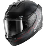 Black motorcycle helmet with a clear visor on a white background