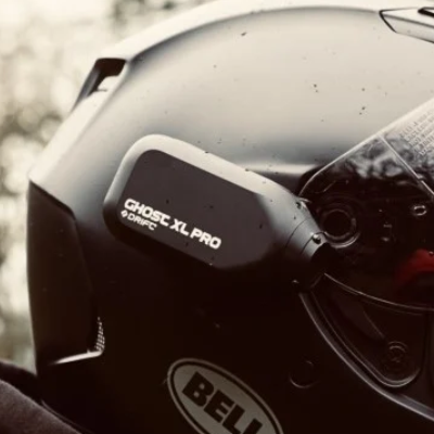 Ghost XL Pro motorcycle action camera on helmet. 
