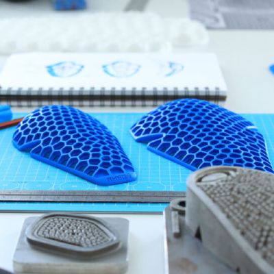 Motorcycle body armour laying on table.