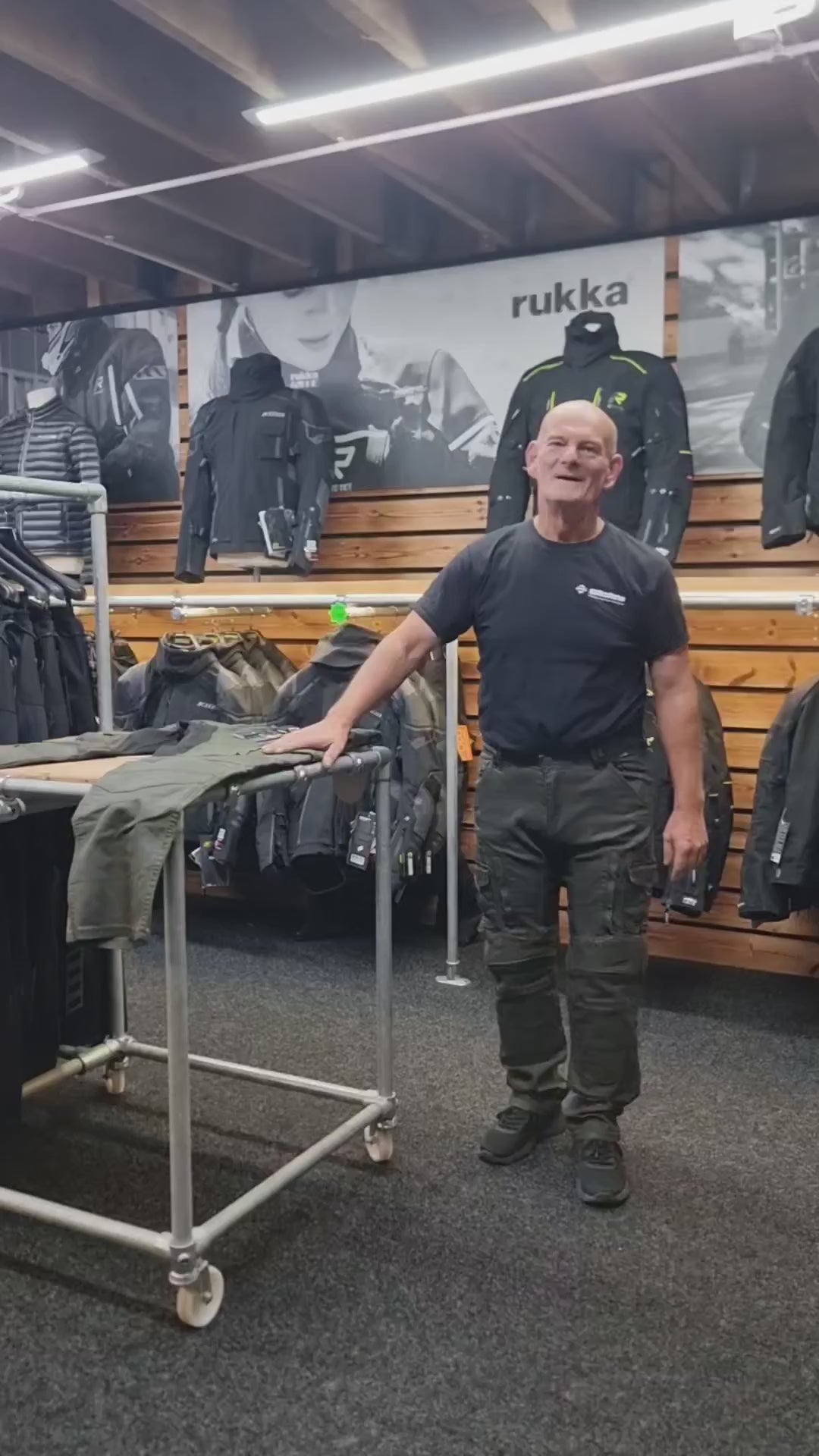 Keith at raceleathers is wearing / showing / talking about a pair of trilobite acid scrambler motorcycle jeans in the Rukka & Klim room of the darwen store.