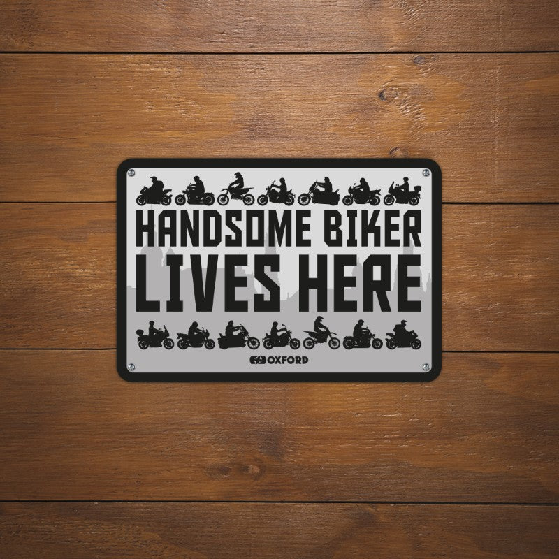 Oxford Garage Metal Sign: Handsome Biker Lives Here