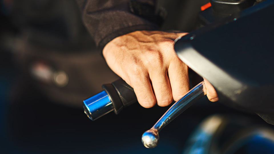 Can I Ride a Motorcycle Without Gloves?