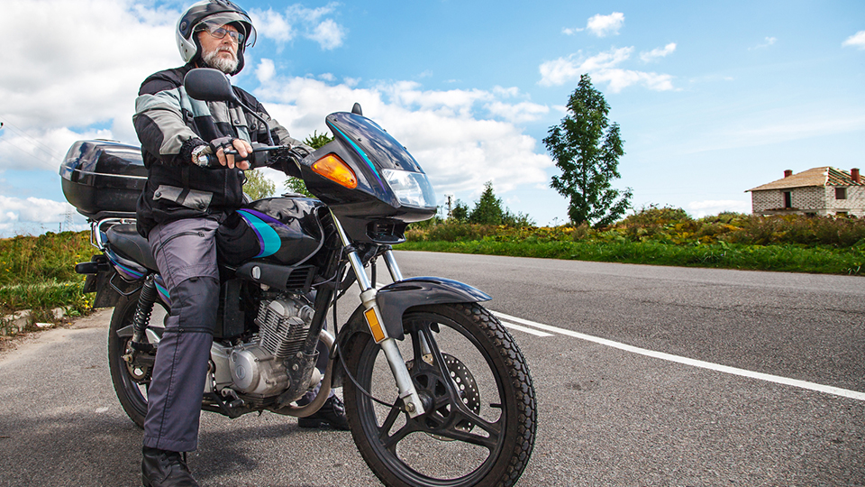 Can I Ride With My Motorcycle Helmet Open?